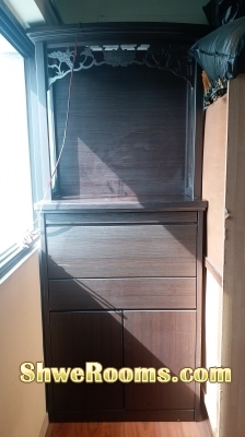 Buddha altar below with cabinet for storage